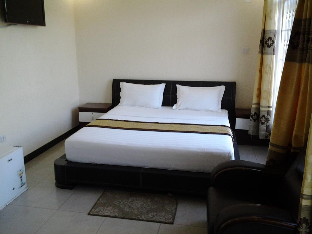 Best Point Hotel Dar es Salaam Habitación foto