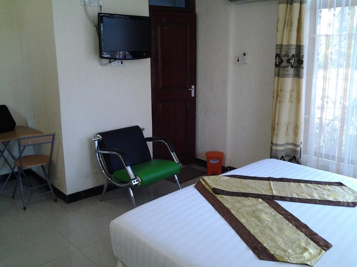 Best Point Hotel Dar es Salaam Habitación foto